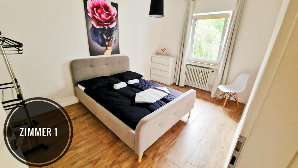 Postel nebo postele na pokoji v ubytování Appartement 4 Personen - Zimmer in Wohnung, zentral, ruhig, modern