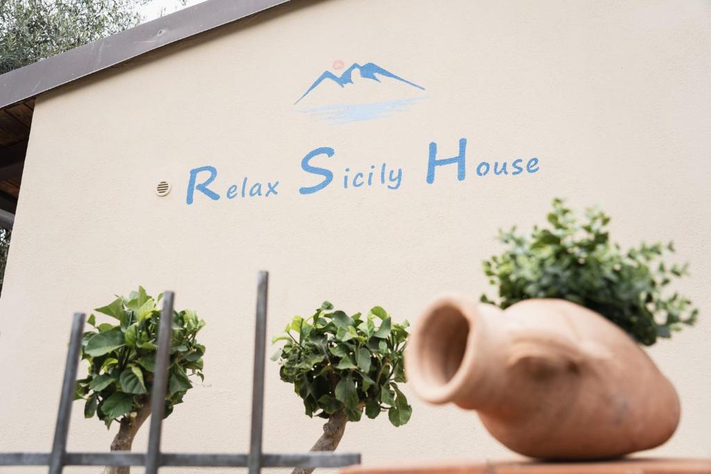 Certifikát, hodnocení, plakát nebo jiný dokument vystavený v ubytování Relax Sicily House