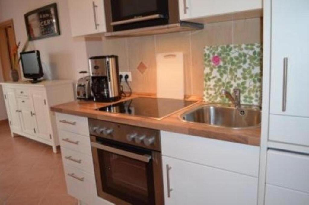 Kuchyň nebo kuchyňský kout v ubytování Usedom Suites Ückeritz