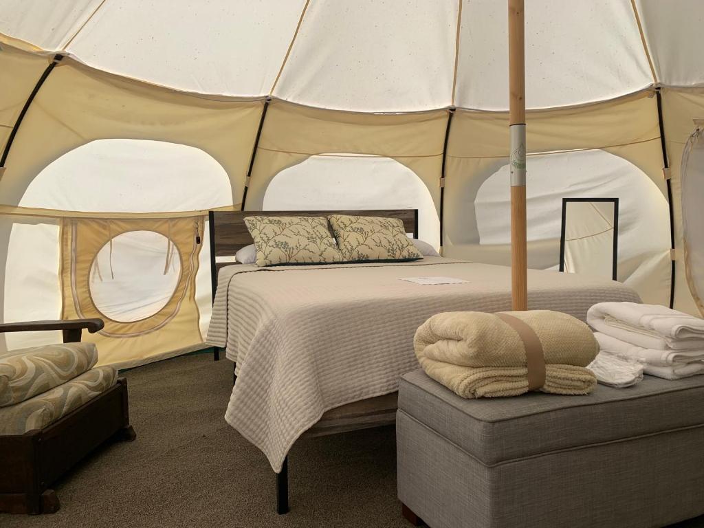Postel nebo postele na pokoji v ubytování HG Glamping