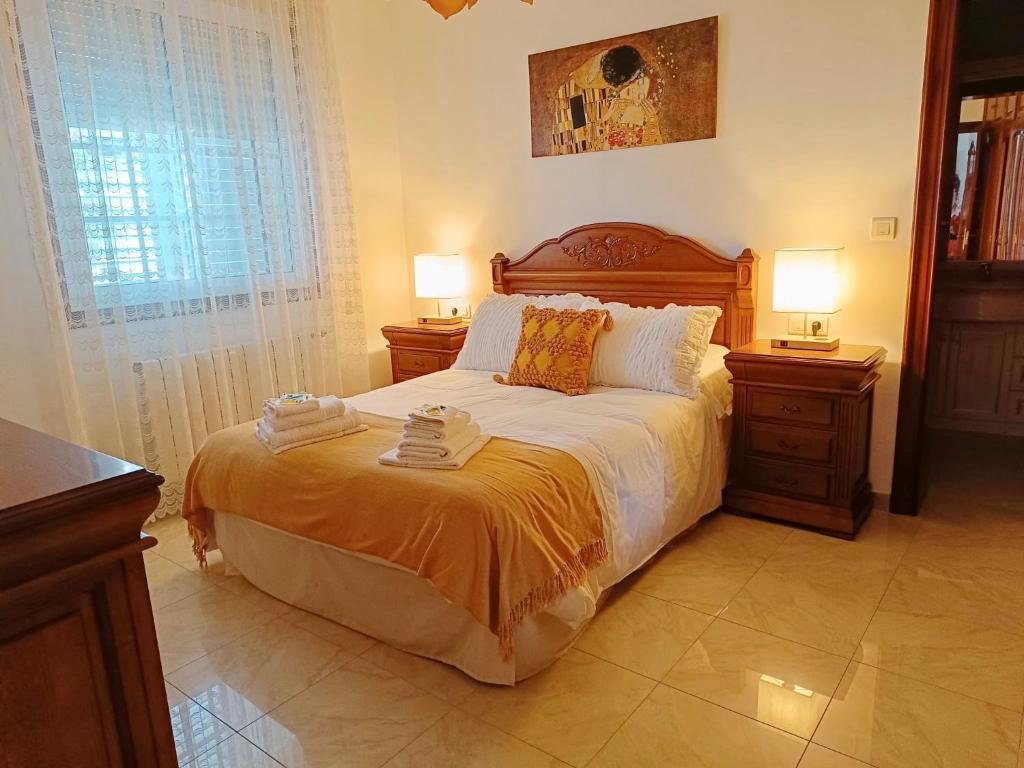 Postel nebo postele na pokoji v ubytování Villa Playa Portomayor BUEU