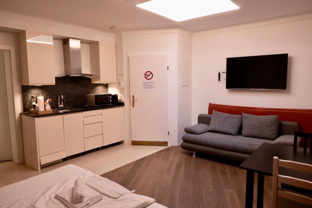 Eldhús eða eldhúskrókur á La Scala Apartments