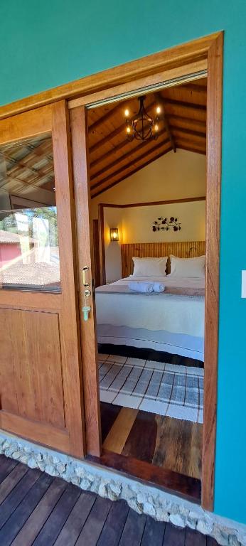 Postel nebo postele na pokoji v ubytování Pousada Vale da Cachoeira