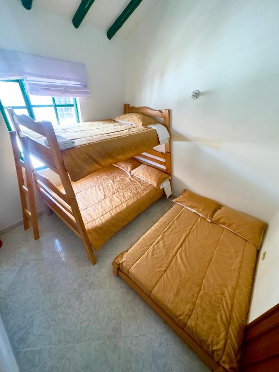 Postel nebo postele na pokoji v ubytování H-OSTELLO LA MERIDIANA