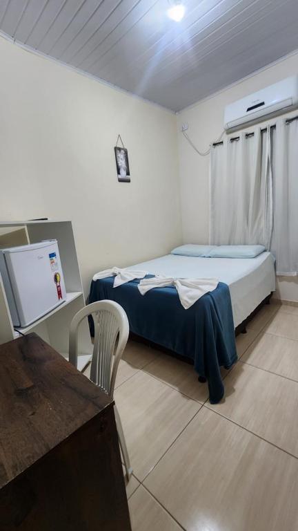 Postel nebo postele na pokoji v ubytování Hotel Raio do Sol