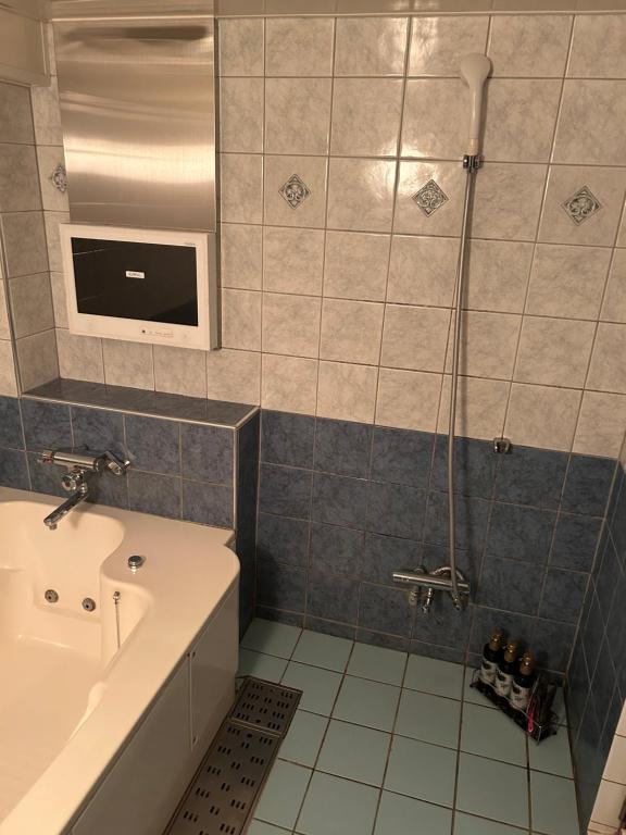Vannituba majutusasutuses Hotel AKAIKUTSU - Adult Only