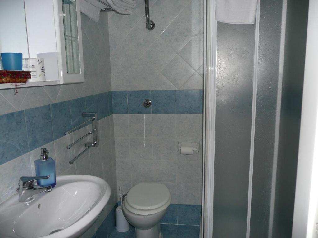 Koupelna v ubytování I Papiri B&B Aparthotel