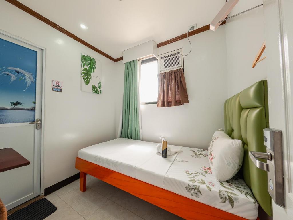 Postel nebo postele na pokoji v ubytování La Choeben Suites