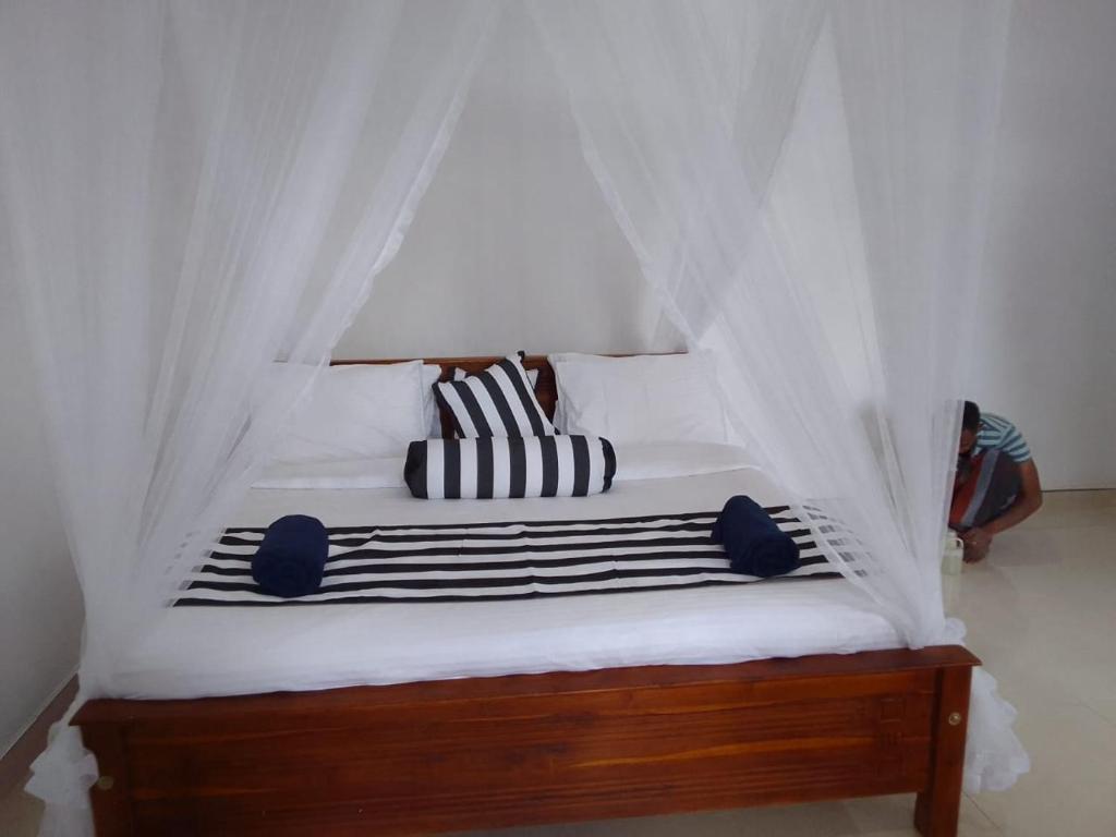 Postel nebo postele na pokoji v ubytování Sadew Home Stay