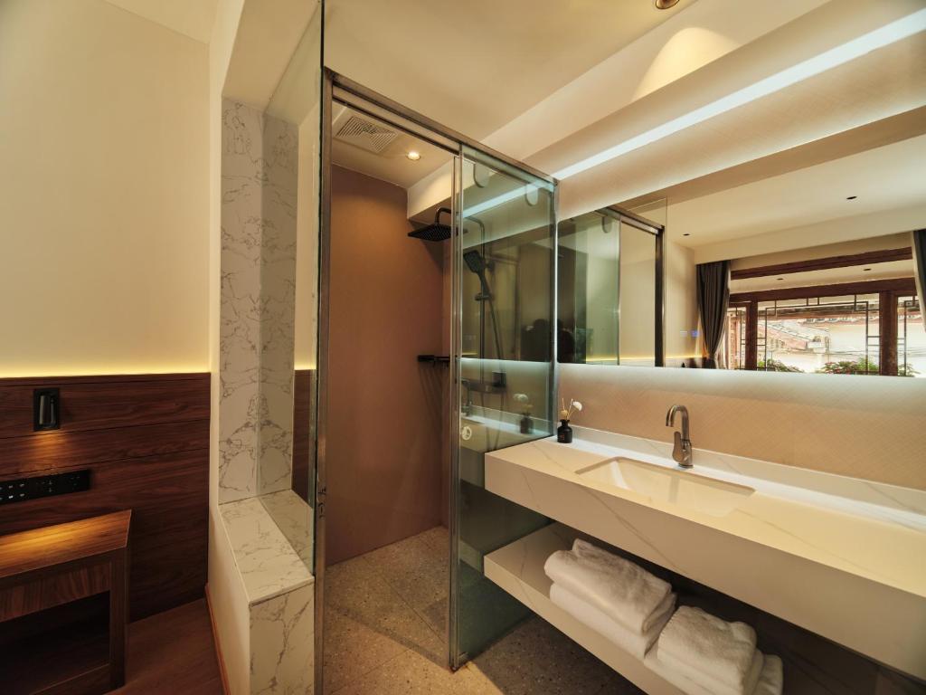 Koupelna v ubytování 夕露小榭古城南门店 Xilu Xiaoxie Inn Old Town Lijiang