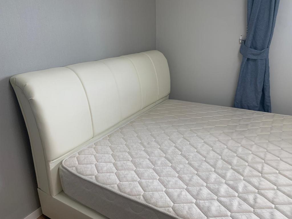 Voodi või voodid majutusasutuse Nice cozy apartment toas