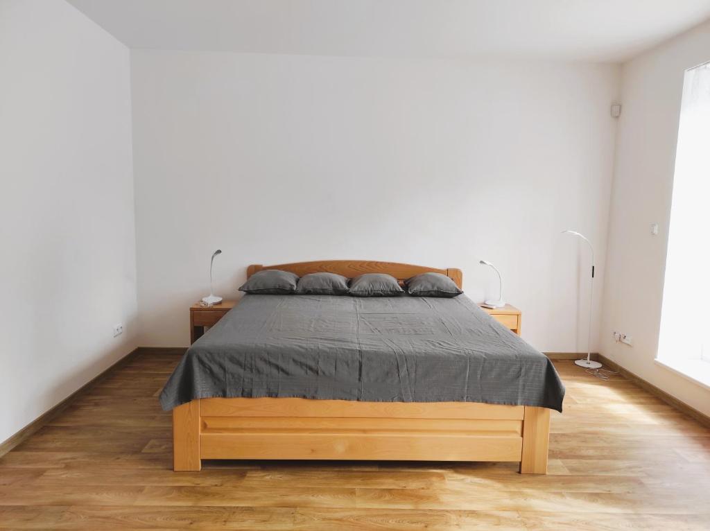 Postel nebo postele na pokoji v ubytování Apartmány Říčky