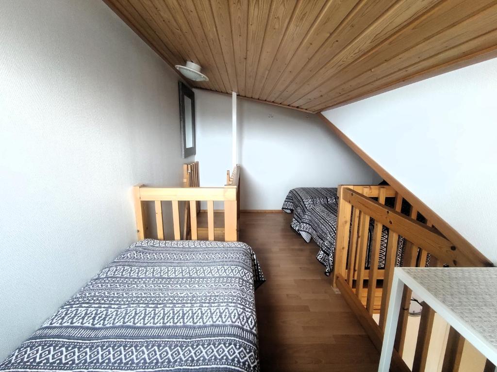 Vuode tai vuoteita majoituspaikassa Leviloma - 27m2 B - Levi huoneisto loma-asunto Levistar majoitus - Levi apartment Levistar accommodation
