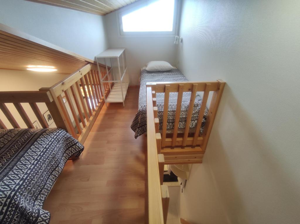 Vuode tai vuoteita majoituspaikassa Leviloma - 27m2 B - Levi huoneisto loma-asunto Levistar majoitus - Levi apartment Levistar accommodation