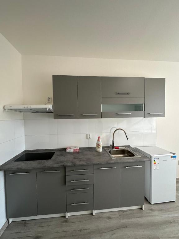 Kuchnia lub aneks kuchenny w obiekcie KK Apartments