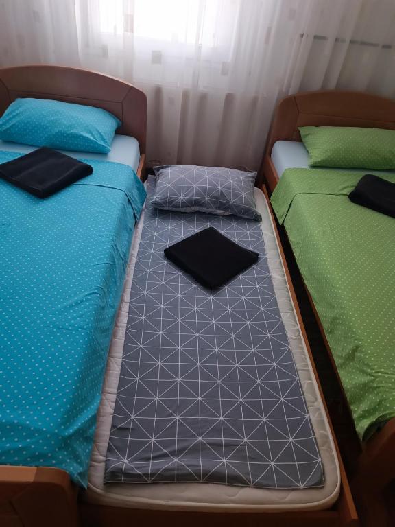 Postel nebo postele na pokoji v ubytování Serbian home with garden