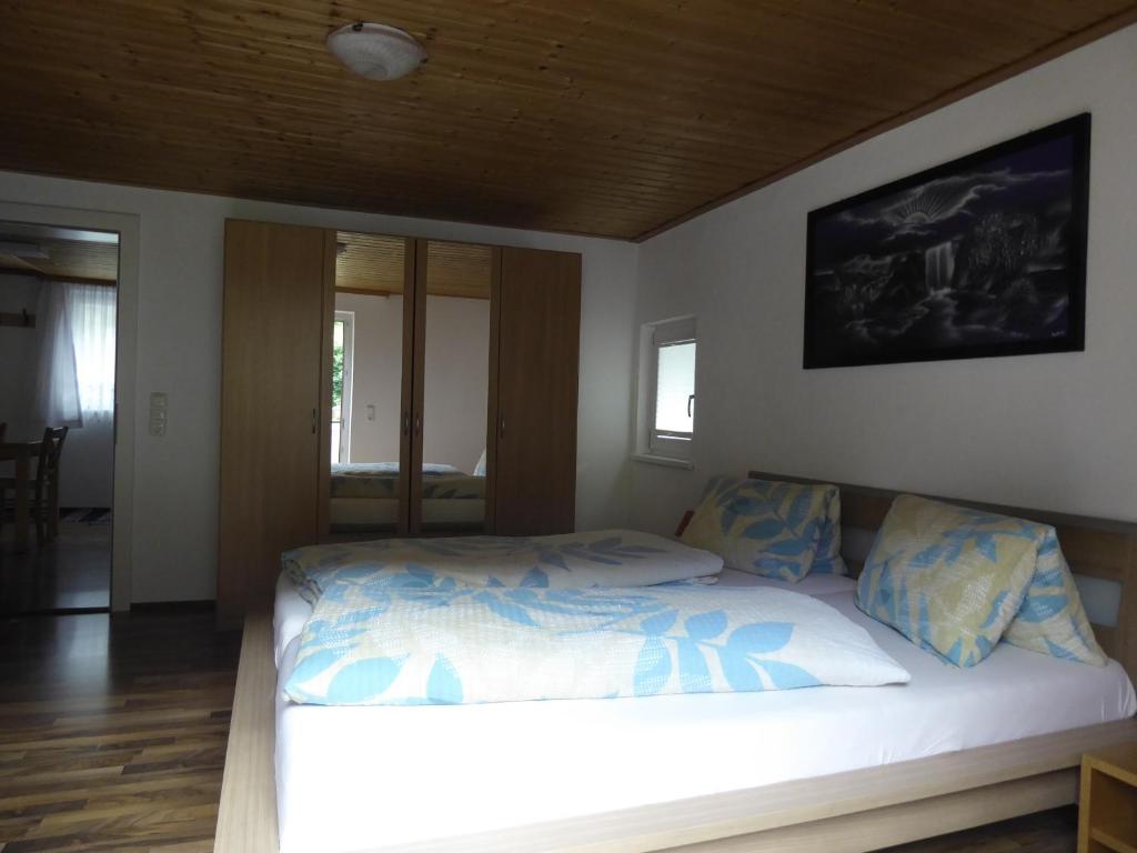 Postel nebo postele na pokoji v ubytování Haus Can