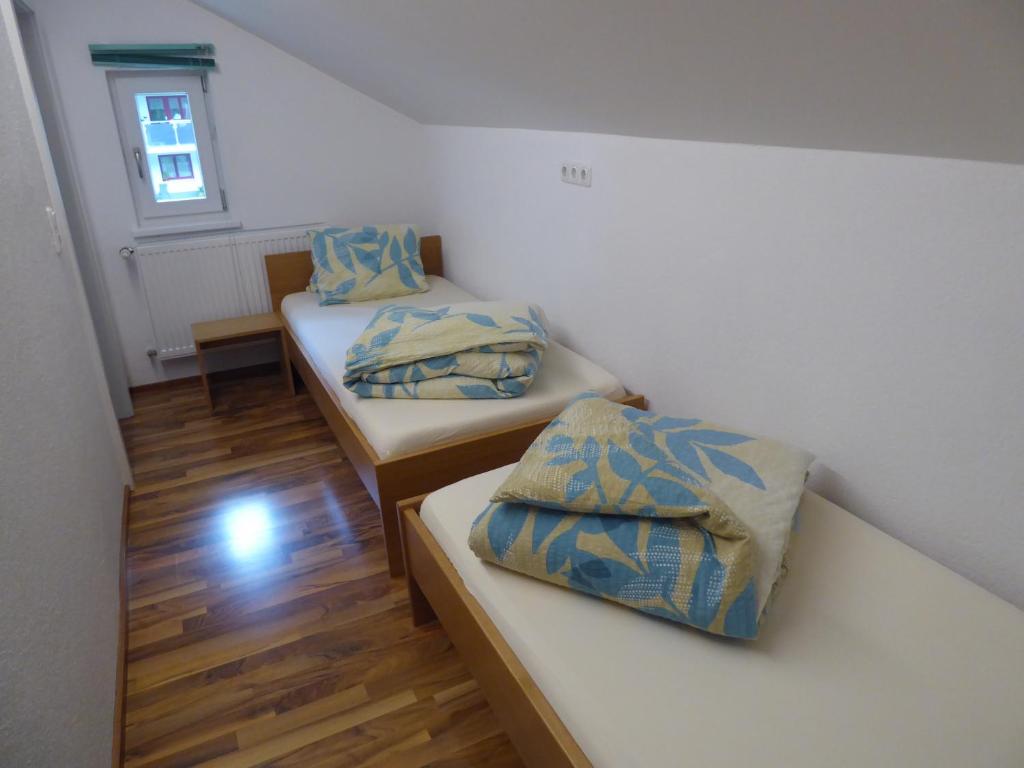 Postel nebo postele na pokoji v ubytování Haus Can