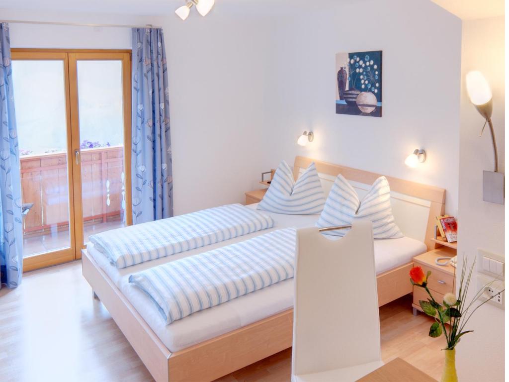 Postel nebo postele na pokoji v ubytování Residence Töglhof