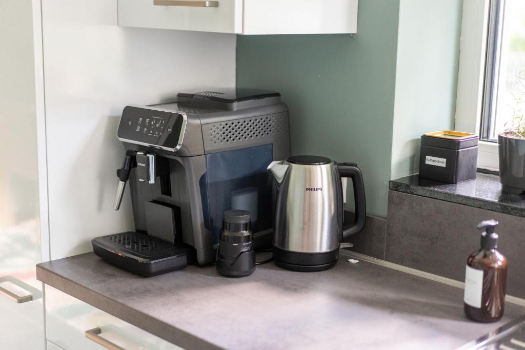 Kuchyň nebo kuchyňský kout v ubytování LITELIVING Familiensuite BoHo