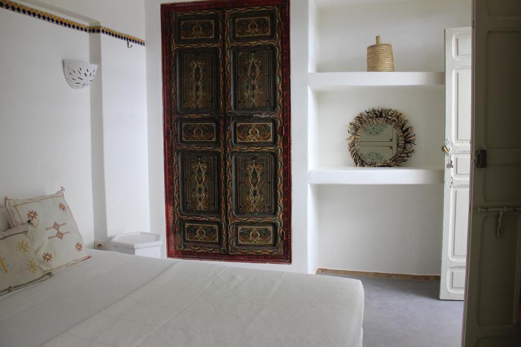 Postel nebo postele na pokoji v ubytování Riad Dar Nael