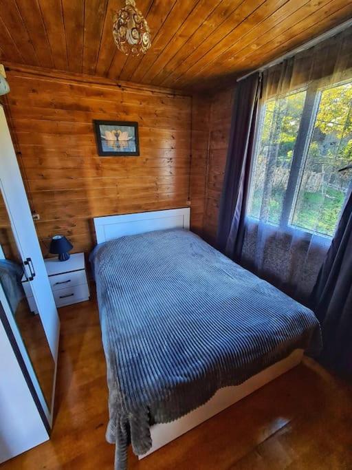 Postel nebo postele na pokoji v ubytování Racha Nanida