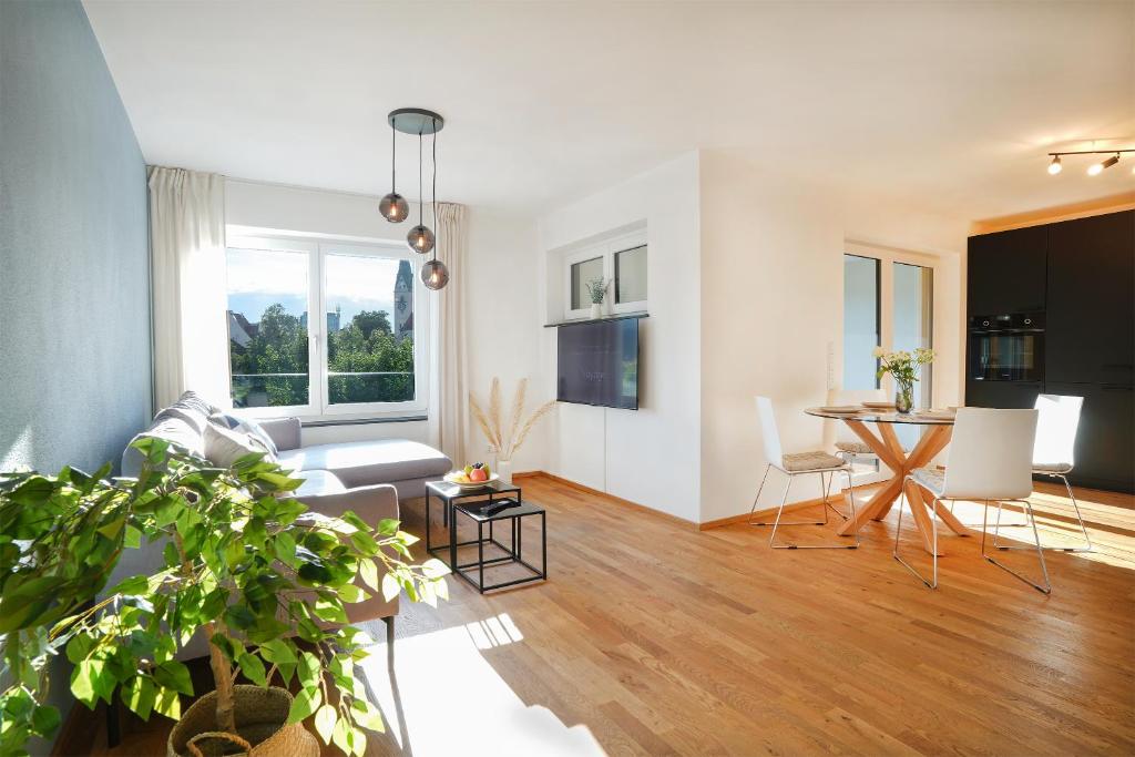 TV a/nebo společenská místnost v ubytování VOYAGE Stadtoase am Fluss I Zentral I freier Parkplatz I Wifi I Netflix I Aufzug