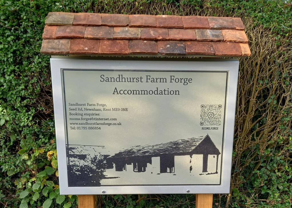 a sign for the sammut farm houseowment at Sandhurst Farm Forge Self Catering Stableblock in Sittingbourne