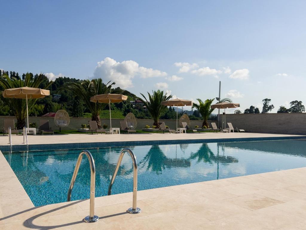 Bazén v ubytování Villa Elysium Park & SPA nebo v jeho okolí
