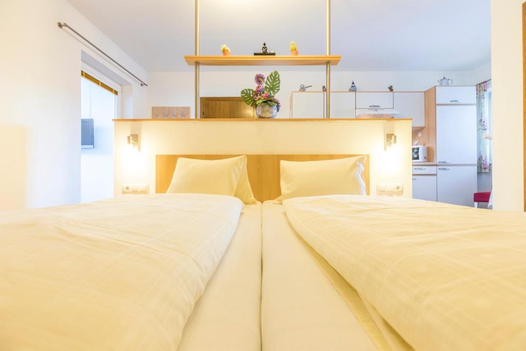 Postel nebo postele na pokoji v ubytování Haus Roswitha