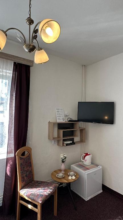 Telewizja i/lub zestaw kina domowego w obiekcie Penzion u Fouska