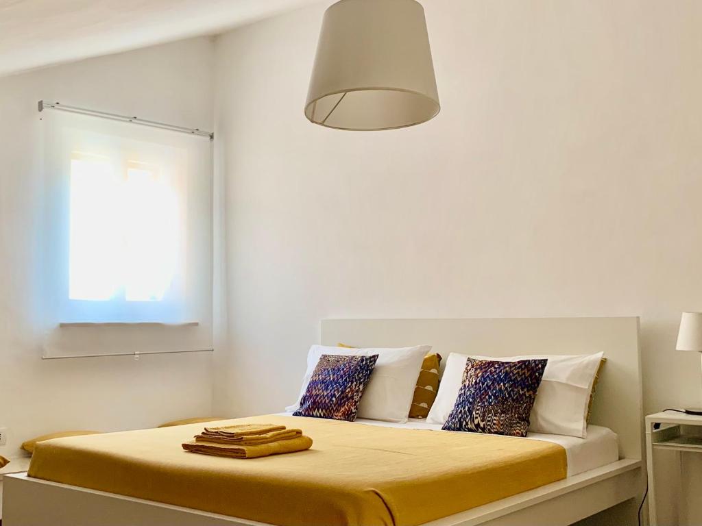 Letto o letti in una camera di APPARTAMENTO SFERISTERIO
