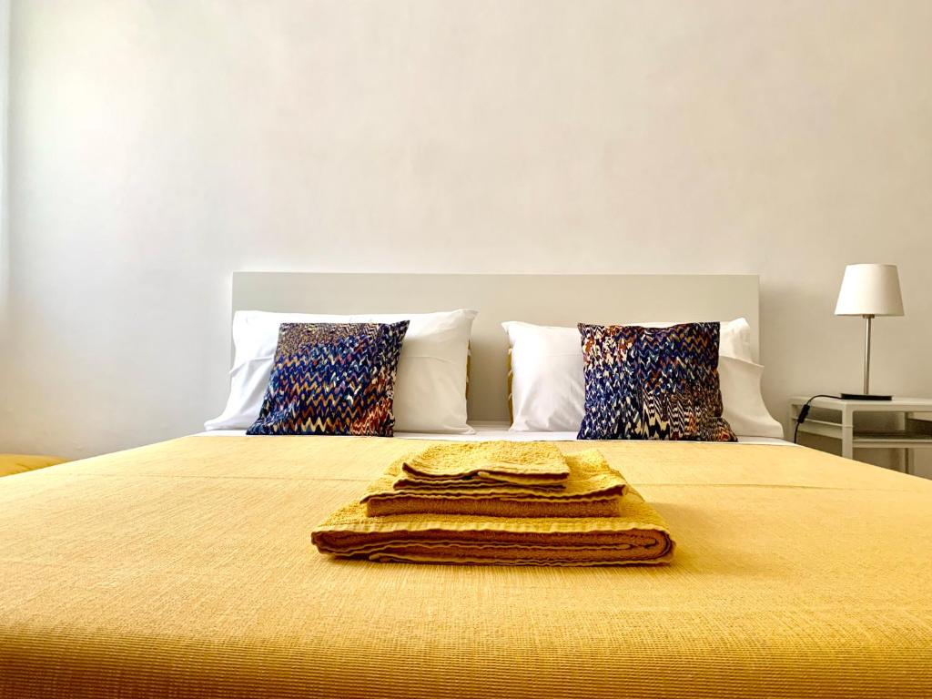 Letto o letti in una camera di APPARTAMENTO SFERISTERIO