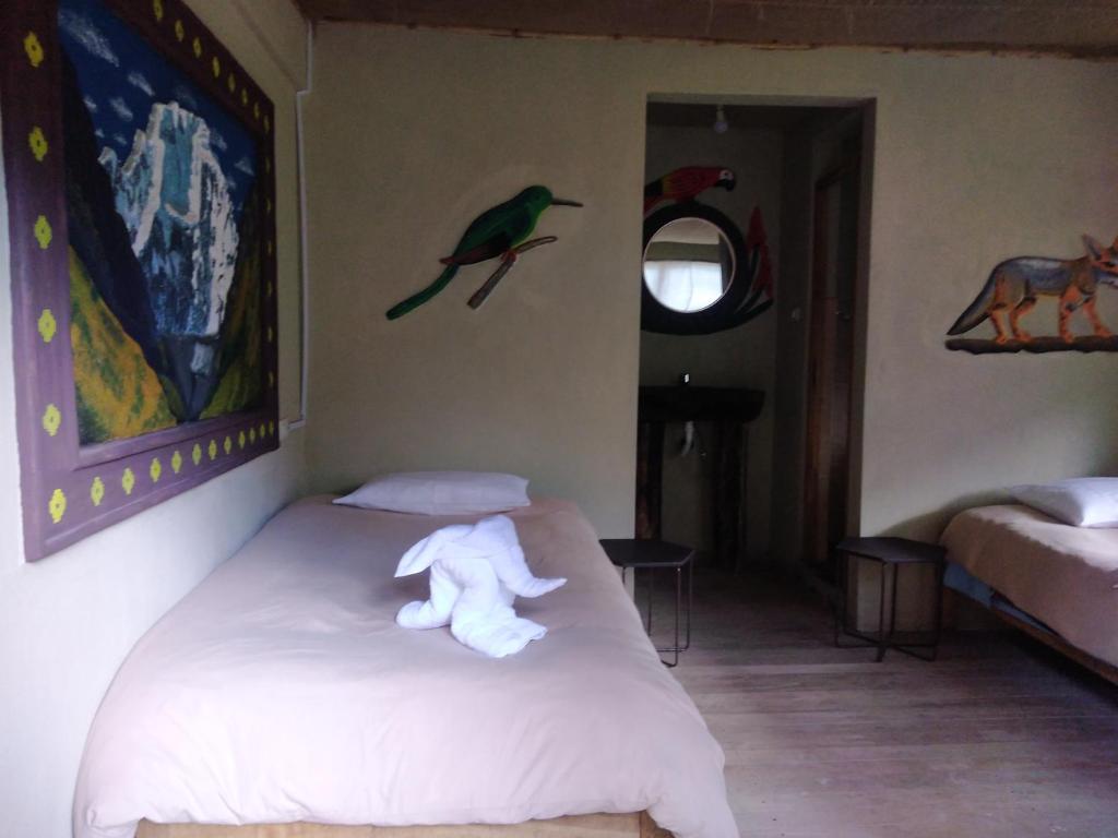 Voodi või voodid majutusasutuse Salkantay Hostel Chaullay toas