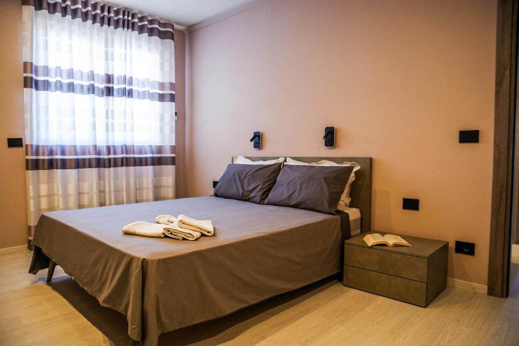 Postel nebo postele na pokoji v ubytování Vista Langhe - CerratoHouses