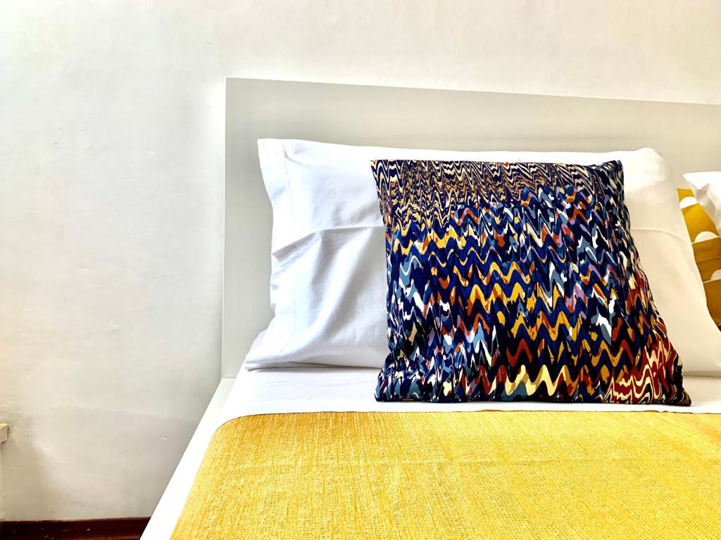 Letto o letti in una camera di APPARTAMENTO SFERISTERIO