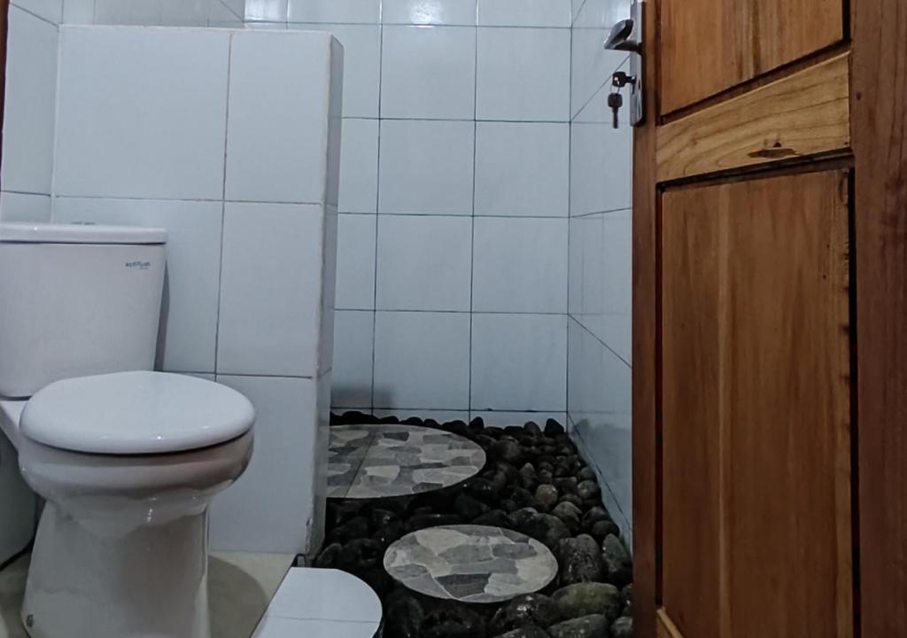 Koupelna v ubytování Sarang Walet Homestay