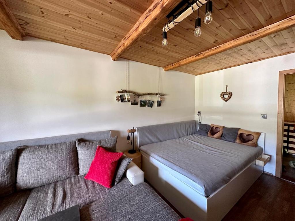 Postel nebo postele na pokoji v ubytování Apartmán s výhledem na Jezerní stěnu