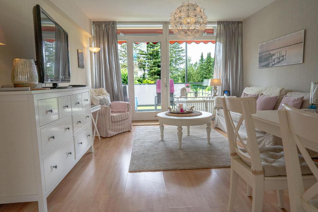 Posezení v ubytování Schwalbennest - Hundefreundlich, Sauna, Pool, Dachterrasse, See & Natur