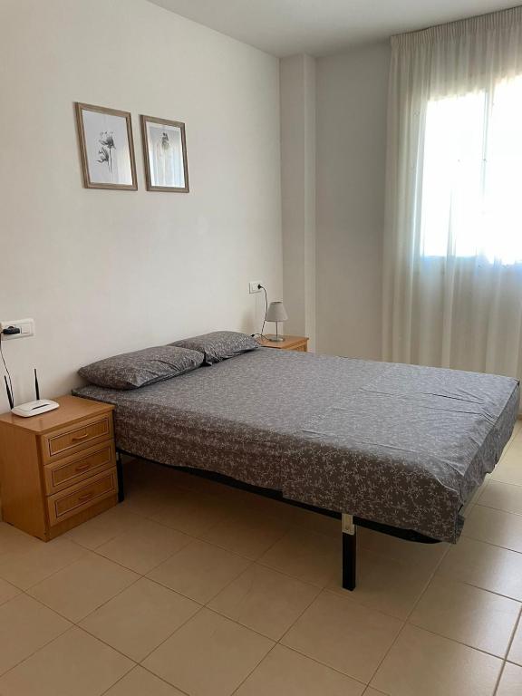 Postel nebo postele na pokoji v ubytování Apartamento en la playa de Riumar