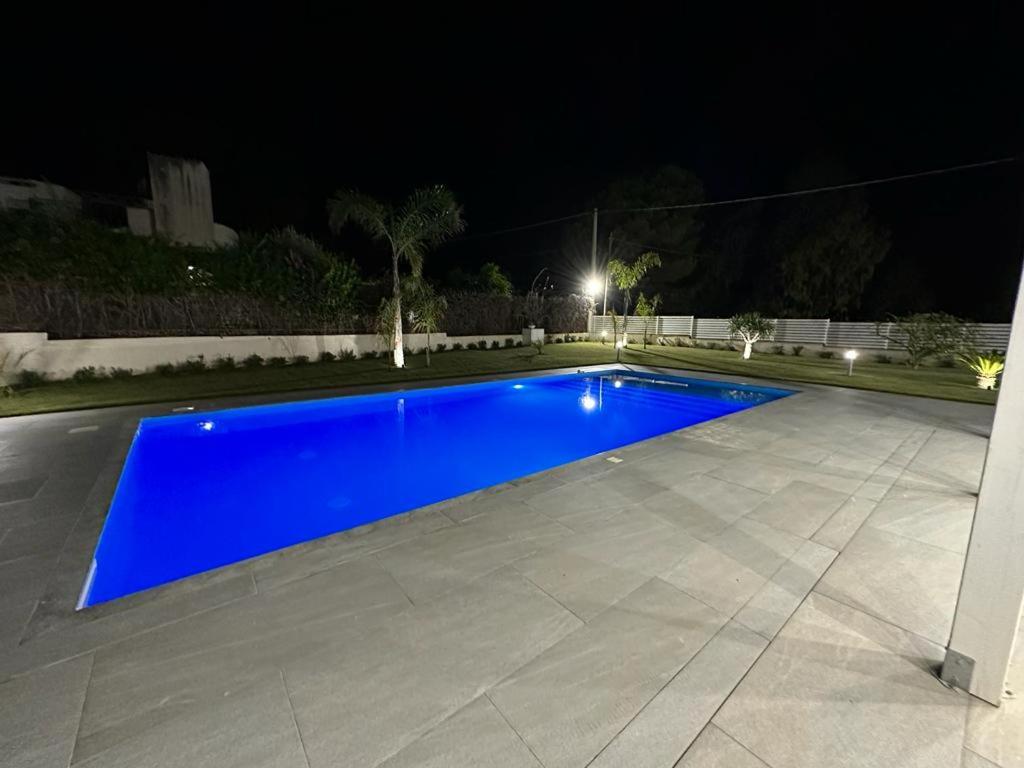 Bazén v ubytování Villa dei Pioppi Deluxe nebo v jeho okolí
