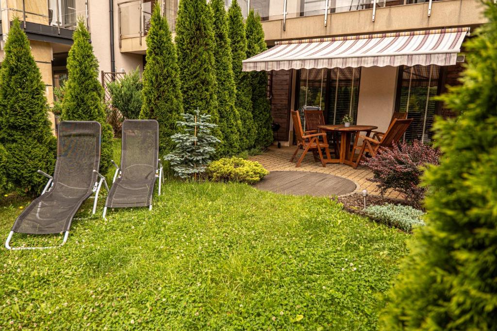 Vonkajšia záhrada v ubytovaní Apartament Sun Hill