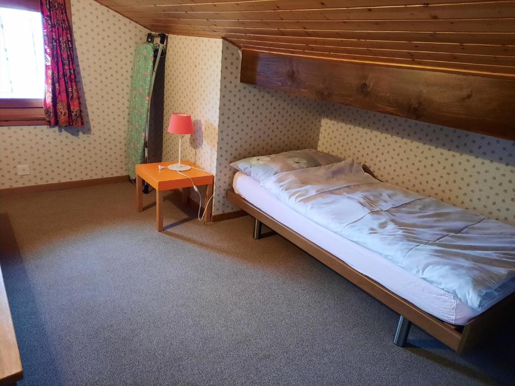 Postel nebo postele na pokoji v ubytování Les Lavandes