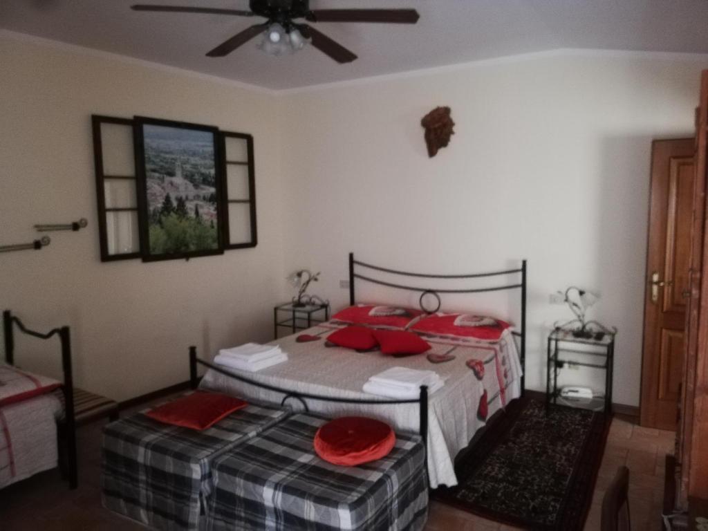 Posteľ alebo postele v izbe v ubytovaní Casa Maria