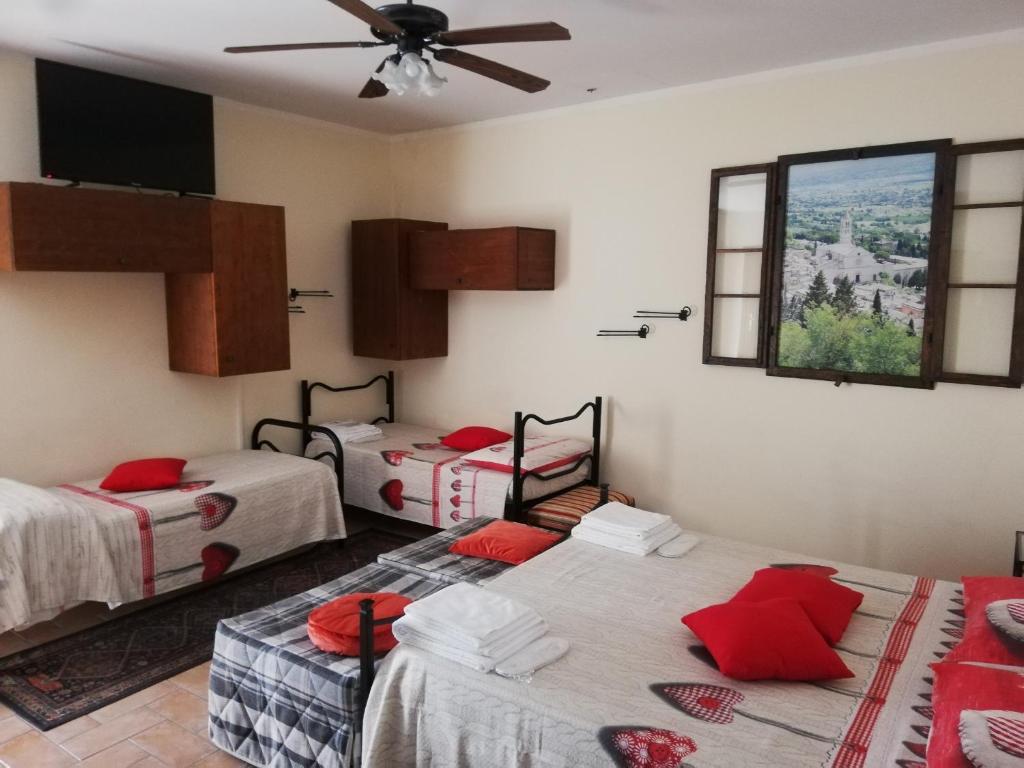 Posteľ alebo postele v izbe v ubytovaní Casa Maria