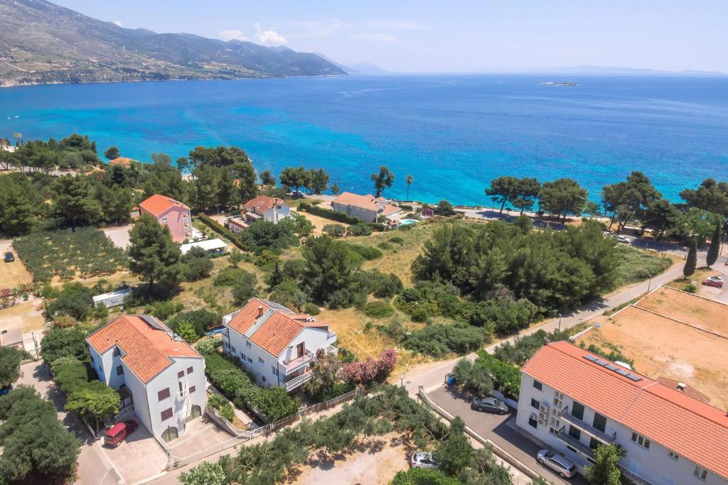 an aerial view of a house and the ocean at apartmani stefan in Orebić