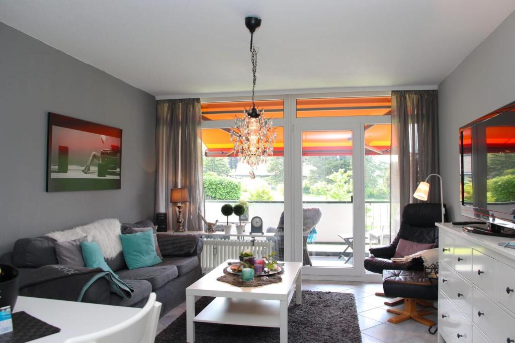 Posezení v ubytování Fichtenwald - Hundefreundlich, Sauna, Pool, Dachterrasse, Wald & See