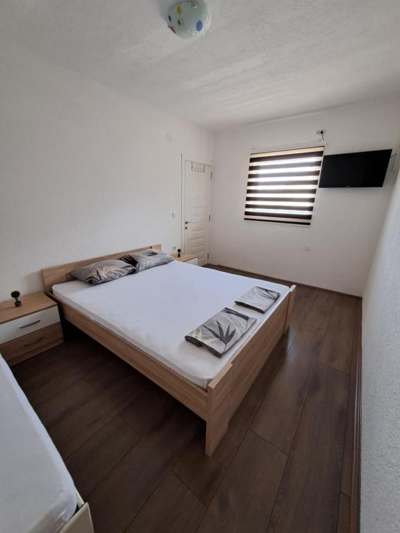 Voodi või voodid majutusasutuse Lazarov Apartments toas