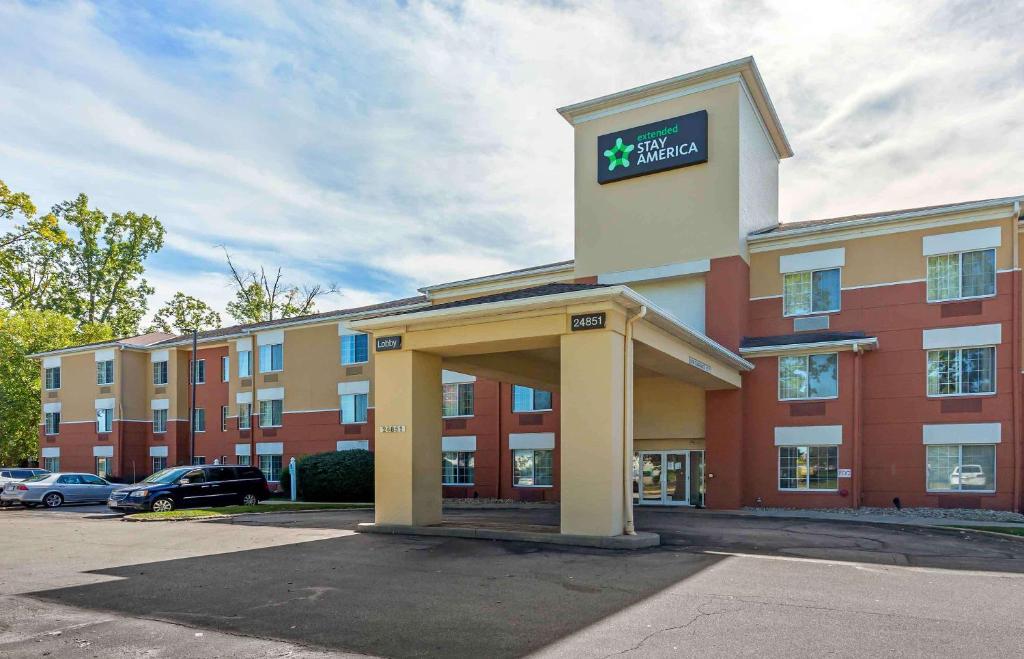 a hotel building with a sign on top of it at Extended Stay America Suites - Cleveland - Airport - North Olmsted in North Olmsted