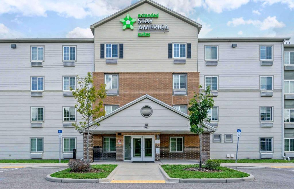 a large white building with a star ambulance sign on it at Extended Stay America Suites - Clearwater in Clearwater